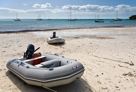 S/V Morgan's Cloud's Avon dinghy hauled up a beach in the Bahamas