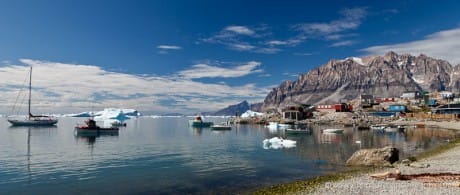 Expedition Sailboat Morgan's Cloud anchored off a West Greenland village