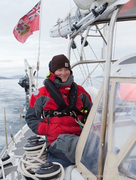 Sitting on sideck of sailboat for ice watch JHH5II-12512
