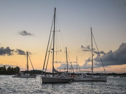 Different types of boat lie in different ways- the narrow tidal anchorage at Sapinho, Baia de Camamu, Brazil.