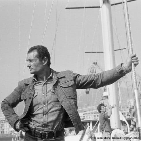 March 1976, Toulon, France — Éric Tabarly visits Alain Colas on his new giant yacht, Le Club Mediterranee.