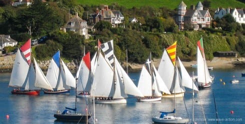 Falmouth working boats line up at the start of an evening’s racing.