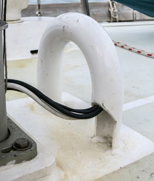 A swan neck is the answer to getting wiring – not water – below decks