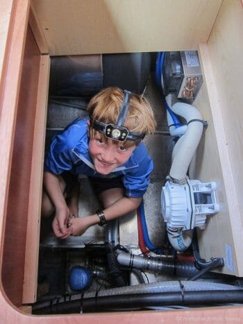 Helping clean the bilge.