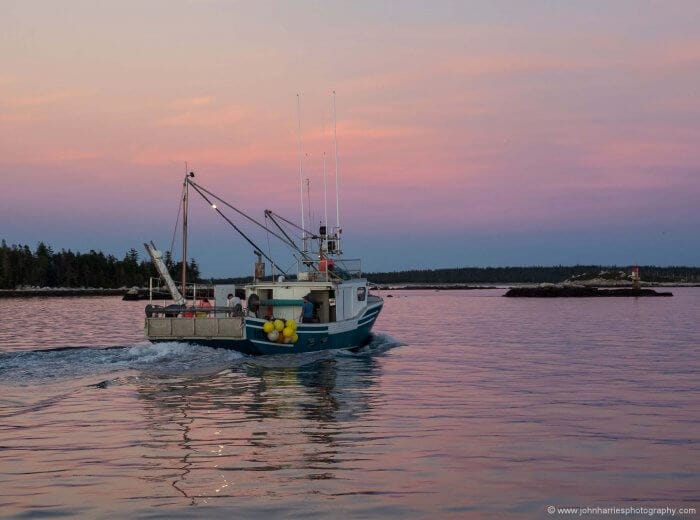 Outbound fishing boat.