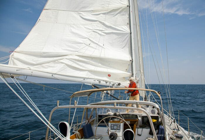 reefing catamaran downwind